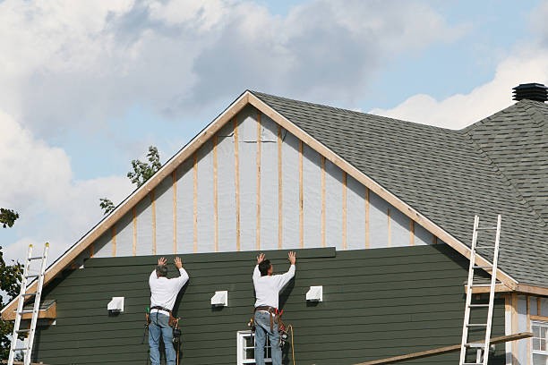 Professional Siding Installation technician working in Parkhill, PA